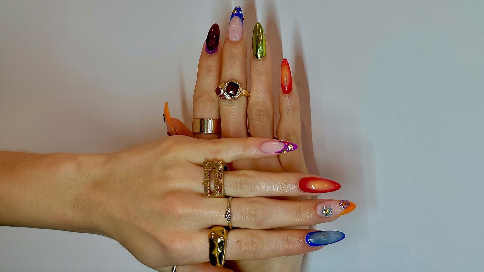 Image may contain Body Part Finger Hand Person Accessories Jewelry Ring and Nail