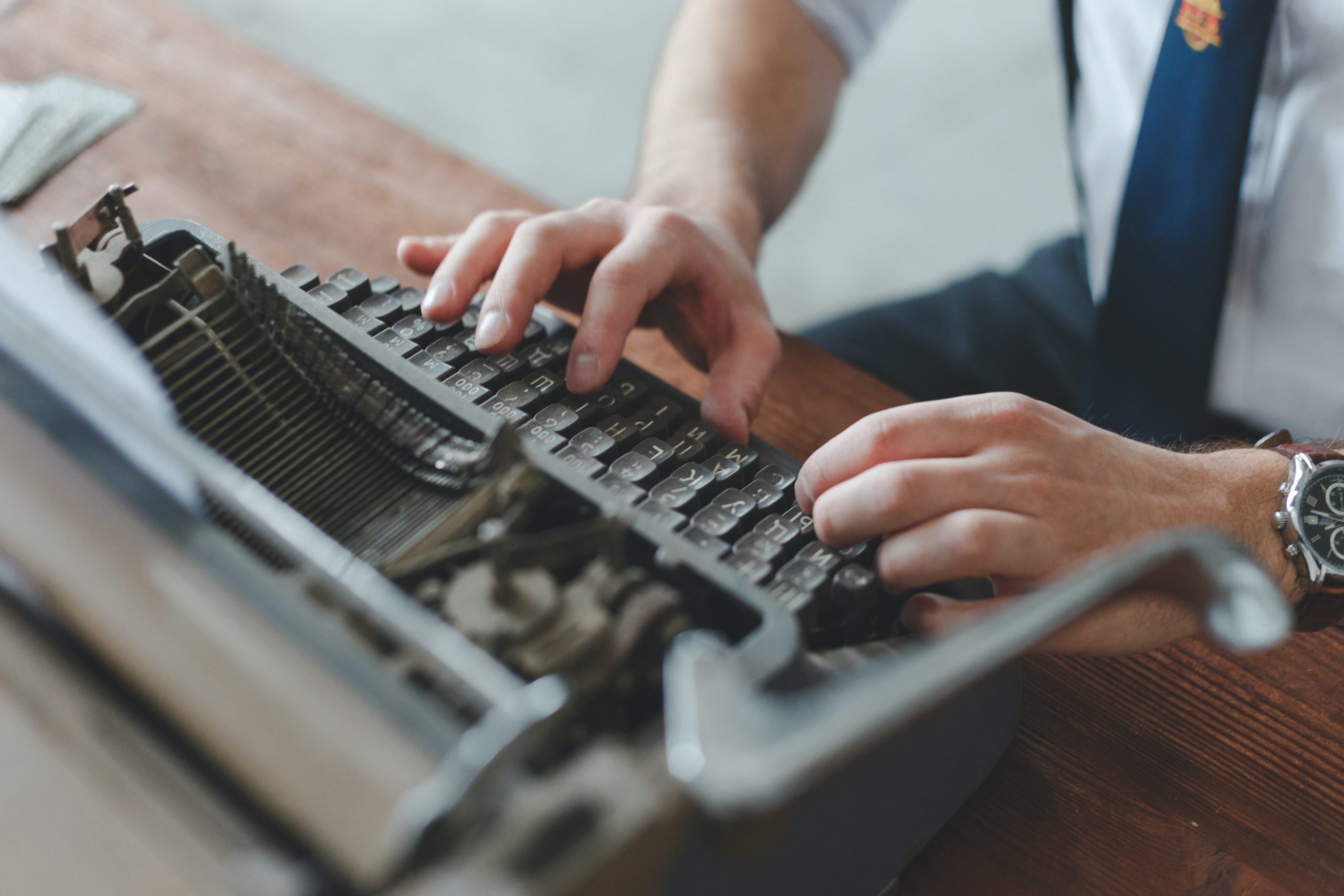 Fingers on a keyboard. Here's Publish Your Purpose: A Step-By-Step Guide To Write, Publish, and Grow Your Big Idea