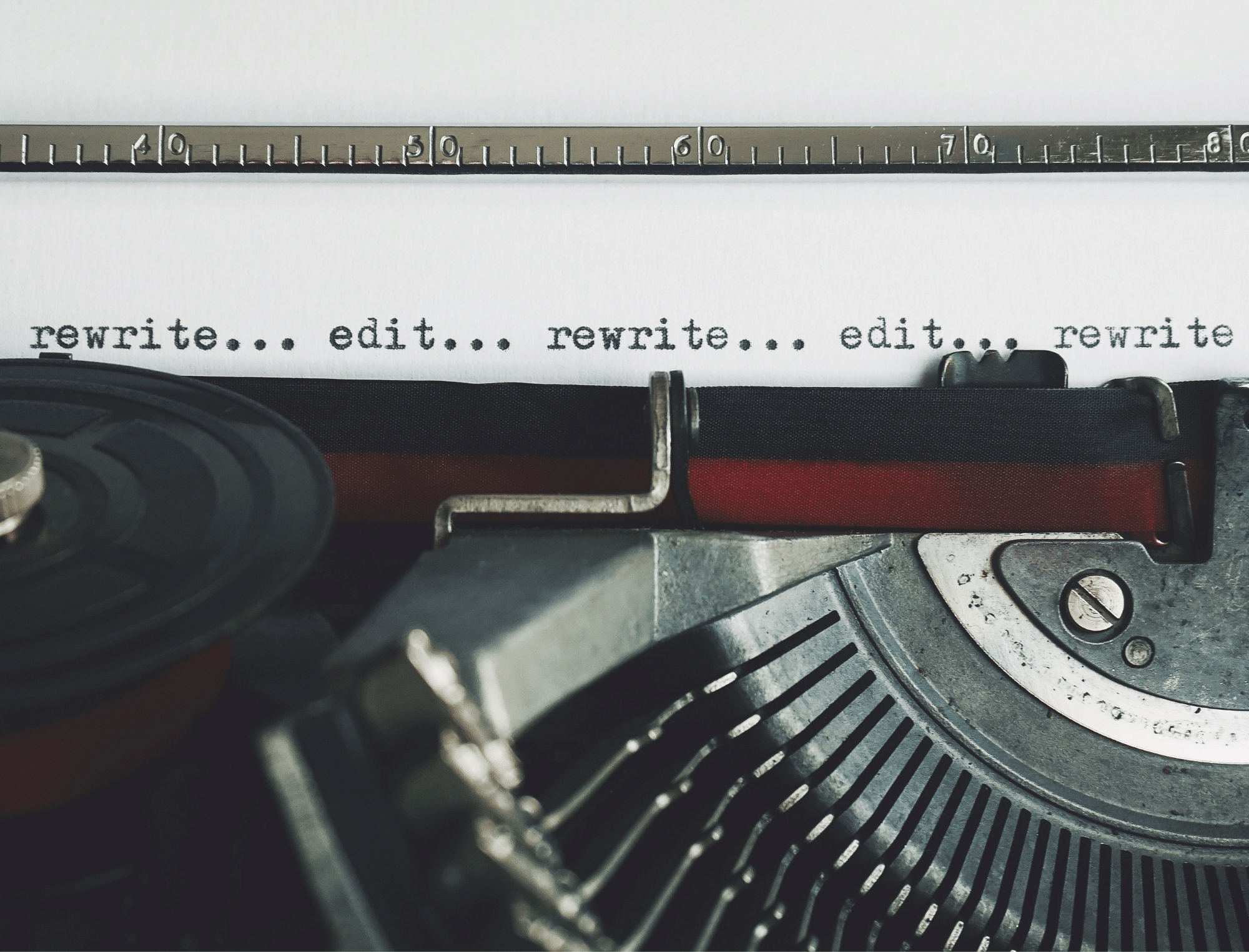 Close-up of a typewriter with words “rewrite/edit.” Let Publish Your Purpose handle your non-fiction editing.